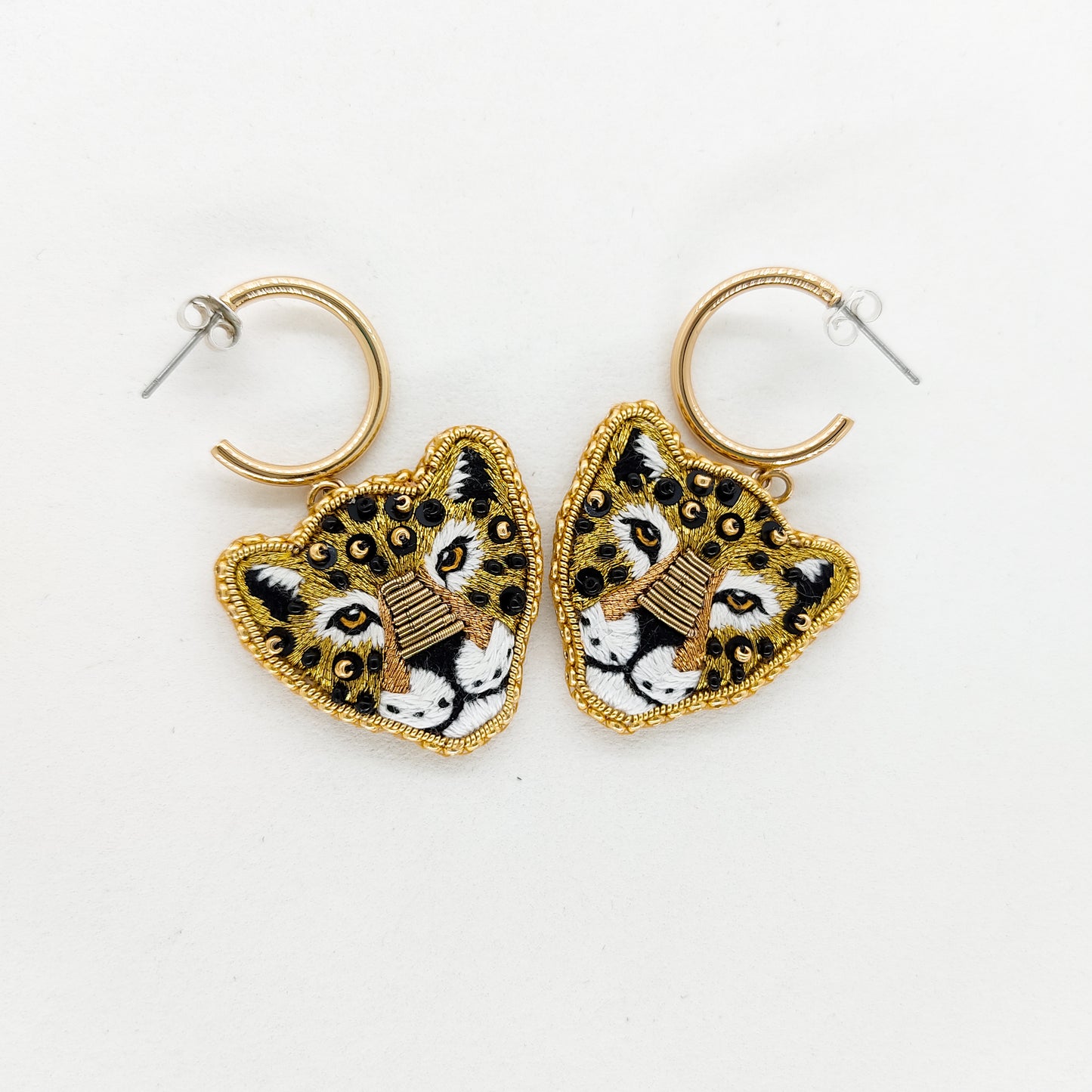 Jaguar IX  — boucles d’oreilles