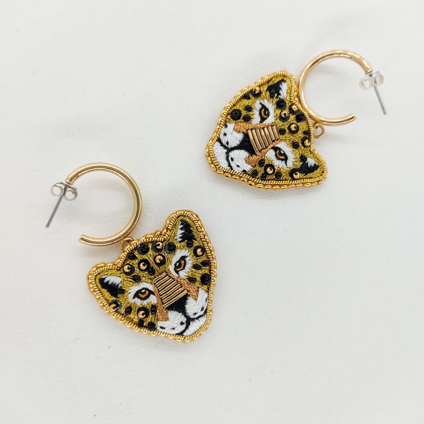 Jaguar IX  — boucles d’oreilles