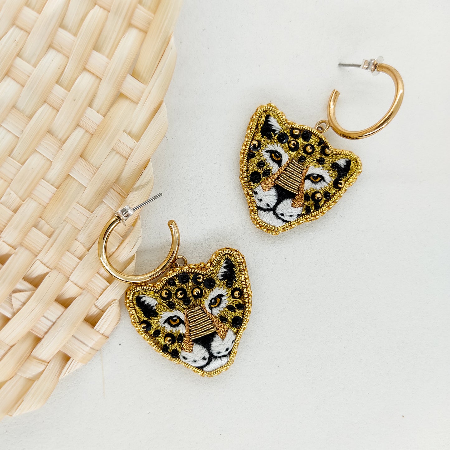 Jaguar IX  — boucles d’oreilles